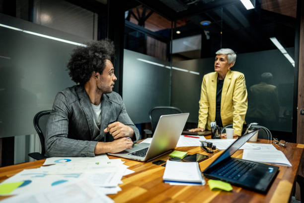 CEO/Manager talking with employee at office